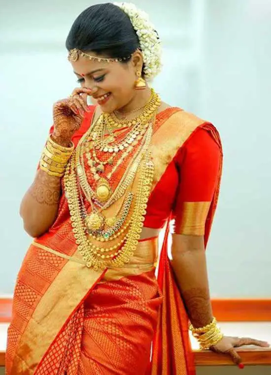 red saree for wedding in kerala