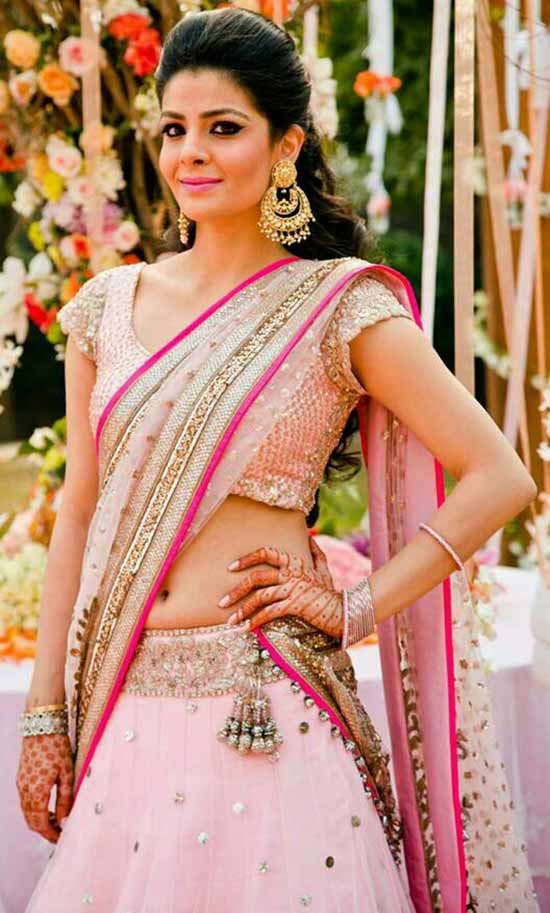 Indian bride wearing pink bridal half saree