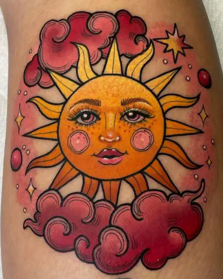 Friendly Sun Tattoo With Pink Clouds