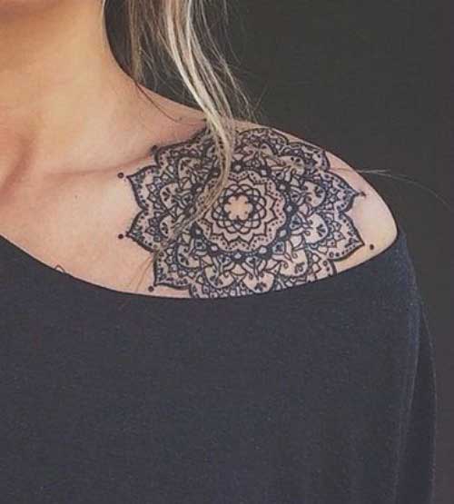 Black color elaborate mandala on the shoulder