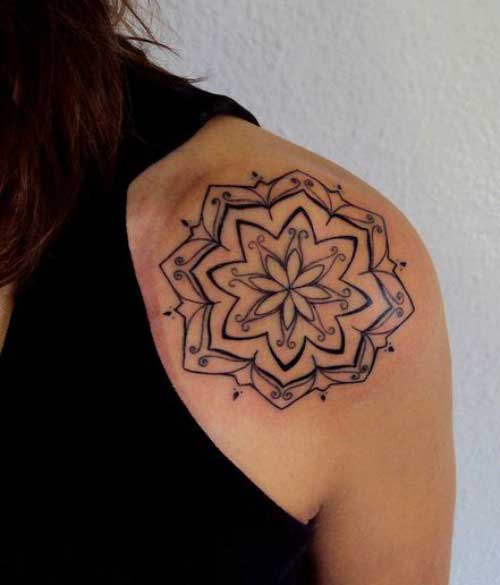 Black color mandala on the shoulder