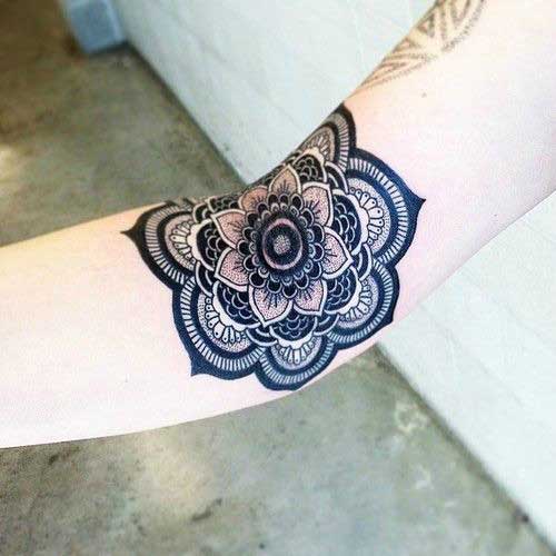Bold color mandala on the arms and forearms