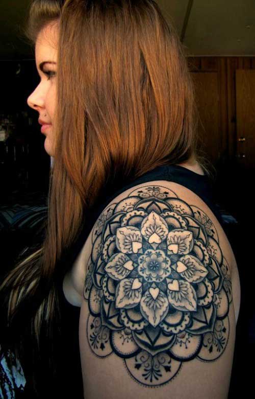 Elaborate flowery mandala on the forearms