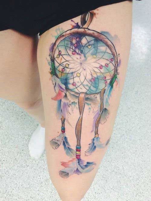 Multi coloured dream catcher with feathers and leather strap