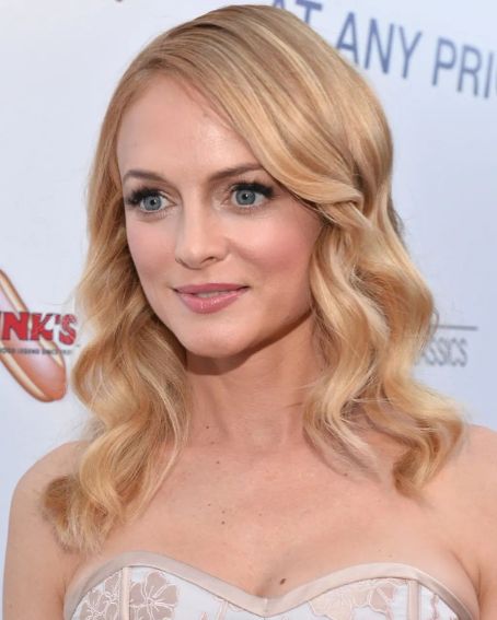 10. Heather Graham short Side Parted Hairstyle
