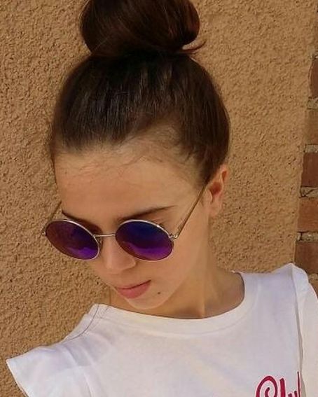 Tight Hair Bun with Purple Shaded Round Frame Sunglasses