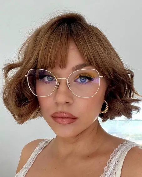 Textured Bob with Wavy Ends and Asymmetrical Bangs