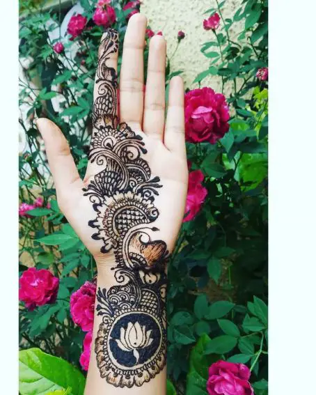 Lotus In The Wrist With Paisley Art In Mehndi
