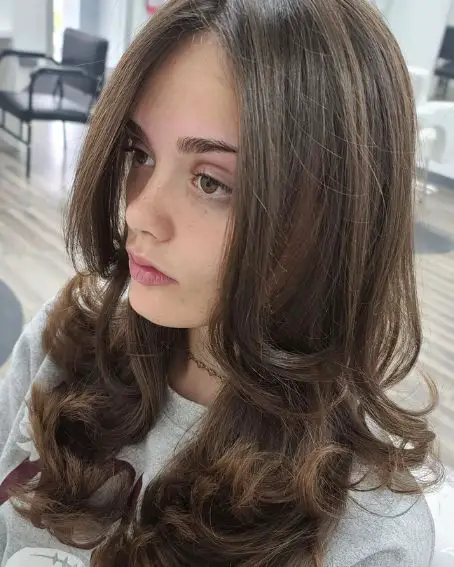 Long Layered Hairstyle With Curled Ends