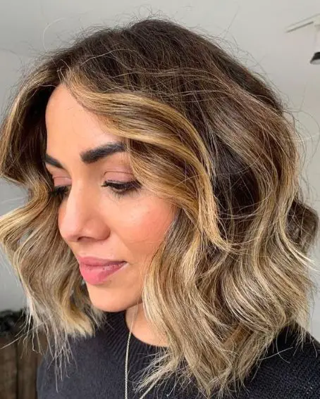 Sliced Layered Bob With Messy Waves