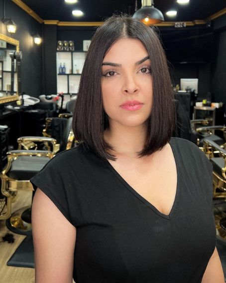 Straight Medium Length Middle Part Bob