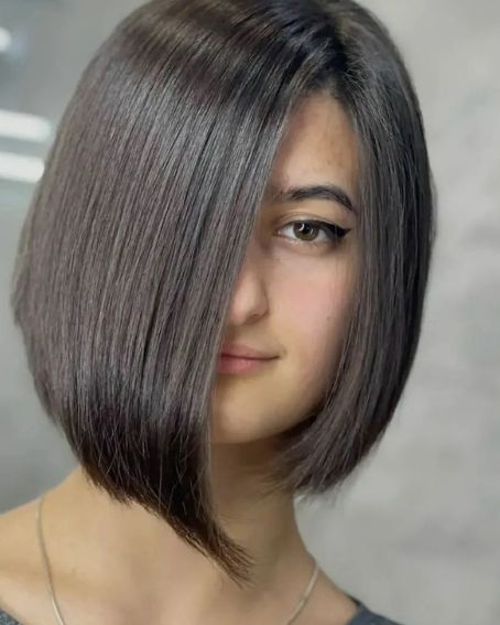 Trendy Asymmetrical Bob Hairstyle For Round Face