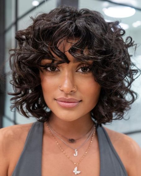 Mid-length Curly With Bang Hairstyle