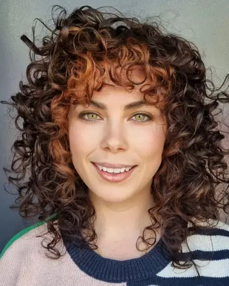 Highlighted Curls In Medium Haircut