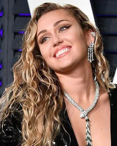 Miley Cyrus In Long Curly
