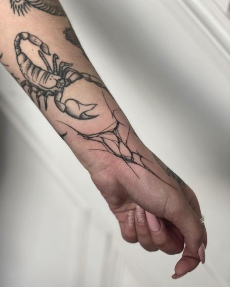 Black Scorpian Gap Filler Tattoo