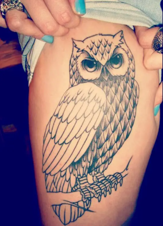 owl tattoo on thigh