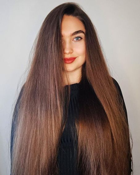 Shiny And Voluminous Straight Hair