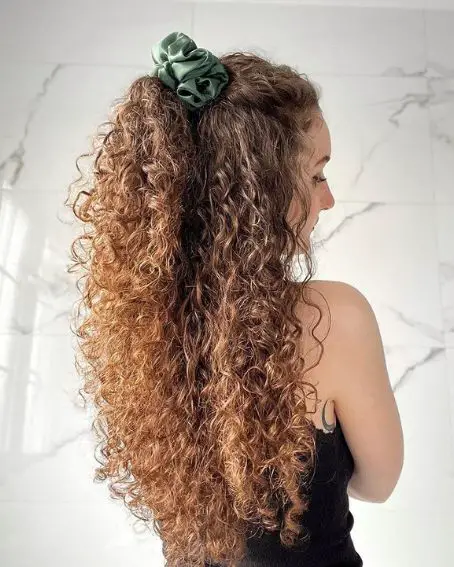 Tangled And Messy Long Blonde Curly Hair Style