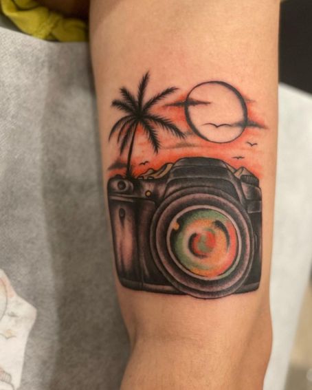 Black Ink Tattoo With Sun Setting Background