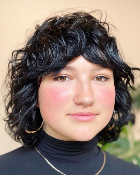 Black Short Curly Shag Hairstyle With Bangs