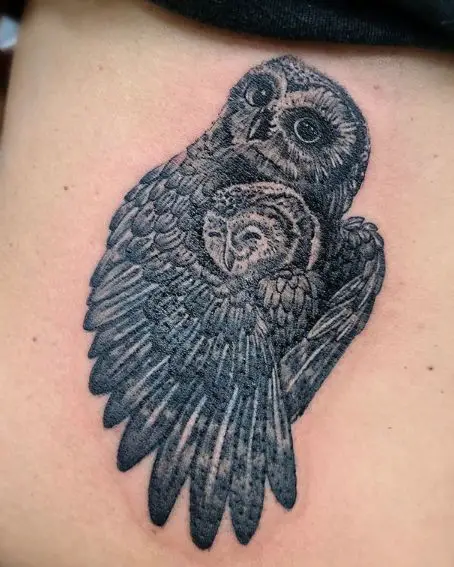 Owl Pic With Its Hugging Baby Tattoo On Back