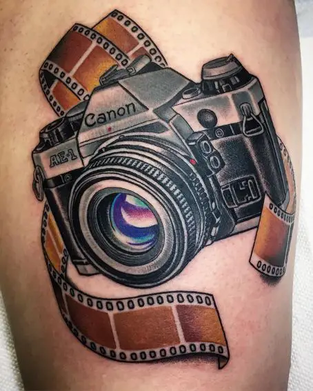 Realistic Camera Tattoo With Reels Around
