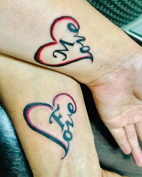 First Letter With Heart Shaped Tattoo For A Couple