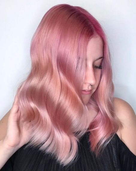 Pinkish Blonde With A Wavy Hairstyle