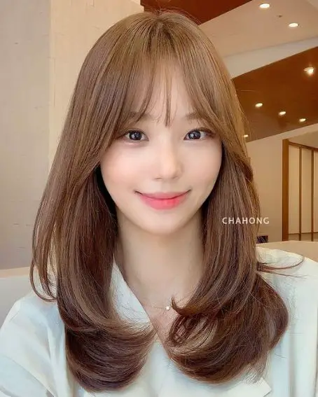 End Curly Hairstyle With Long Bangs