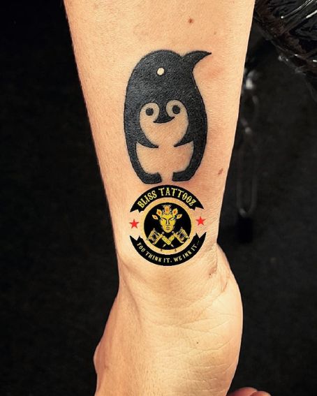 Penguin Tattoo On The Wrists