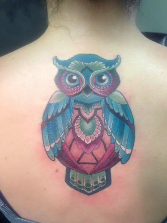 back of neck owl tattoo