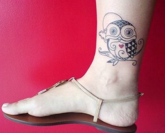owl tattoo on foot