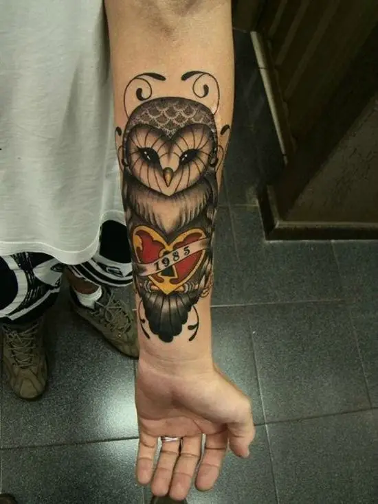 owl tattoo on arm