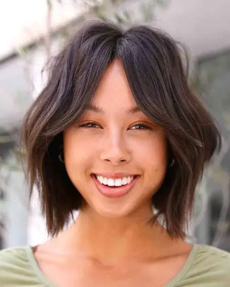 Short Shaggy Bob Hairstyle With A Middle Part