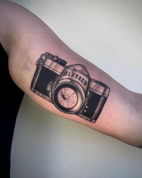 Camera Tattoo With Mosquito On Lens
