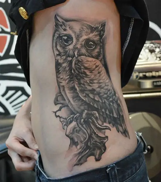 owl tattoo on ribs