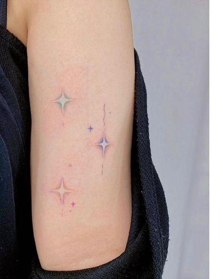 Color-themed Little Star Tattoo