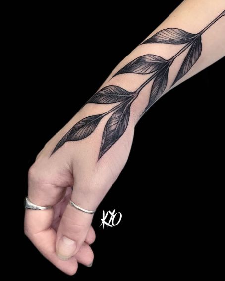 Leaf Tattoo On A Wrist With Lined