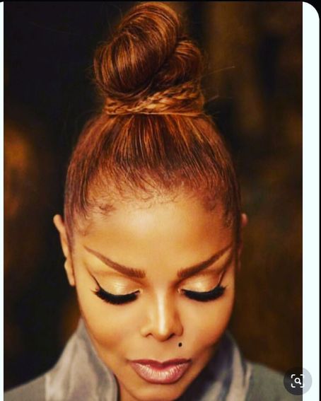 Ceremony Topknot With A Small Braid