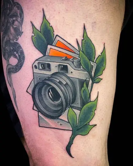 Vintage Camera Tattoo With Leaves And Snake Tattoo