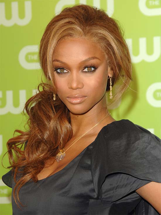 Tyra-Banks-puff-side-ponytail Long Hairstyle for Black Women