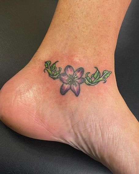 Violet Rose With Green Leaves Ankle Tattoos