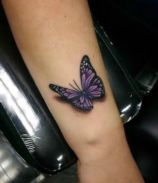 3D butterfly tattoo on arm