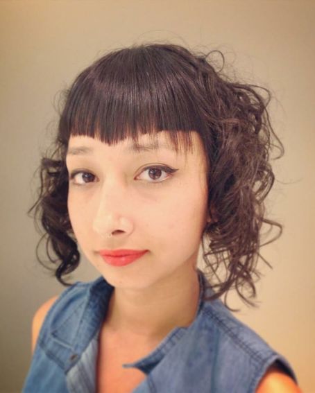 Short Curly Hair With Crooked Fringes