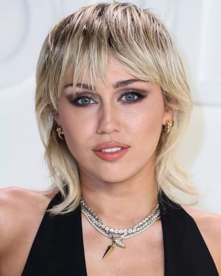 Miley Cyrusin Short Hair With Bangs