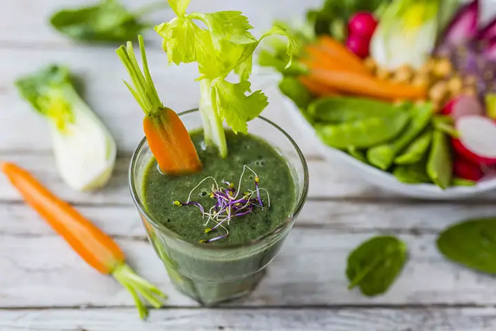 Juice made from carrot, spinach, and celery