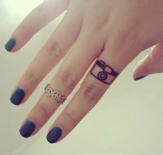Small Camera Tattoo on Finger
