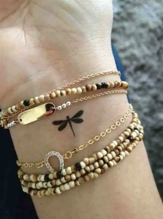 Small Dragonfly Tattoo Design on Wrist