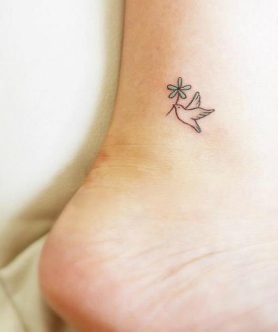 Small dove bird tattoo